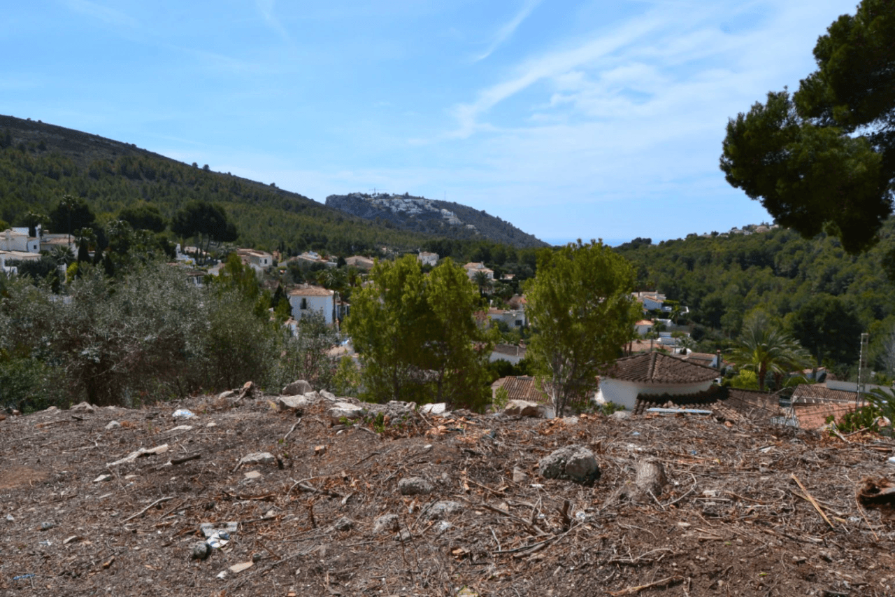 Bouwkavel met uitzicht op zee en bergen in Moraira
