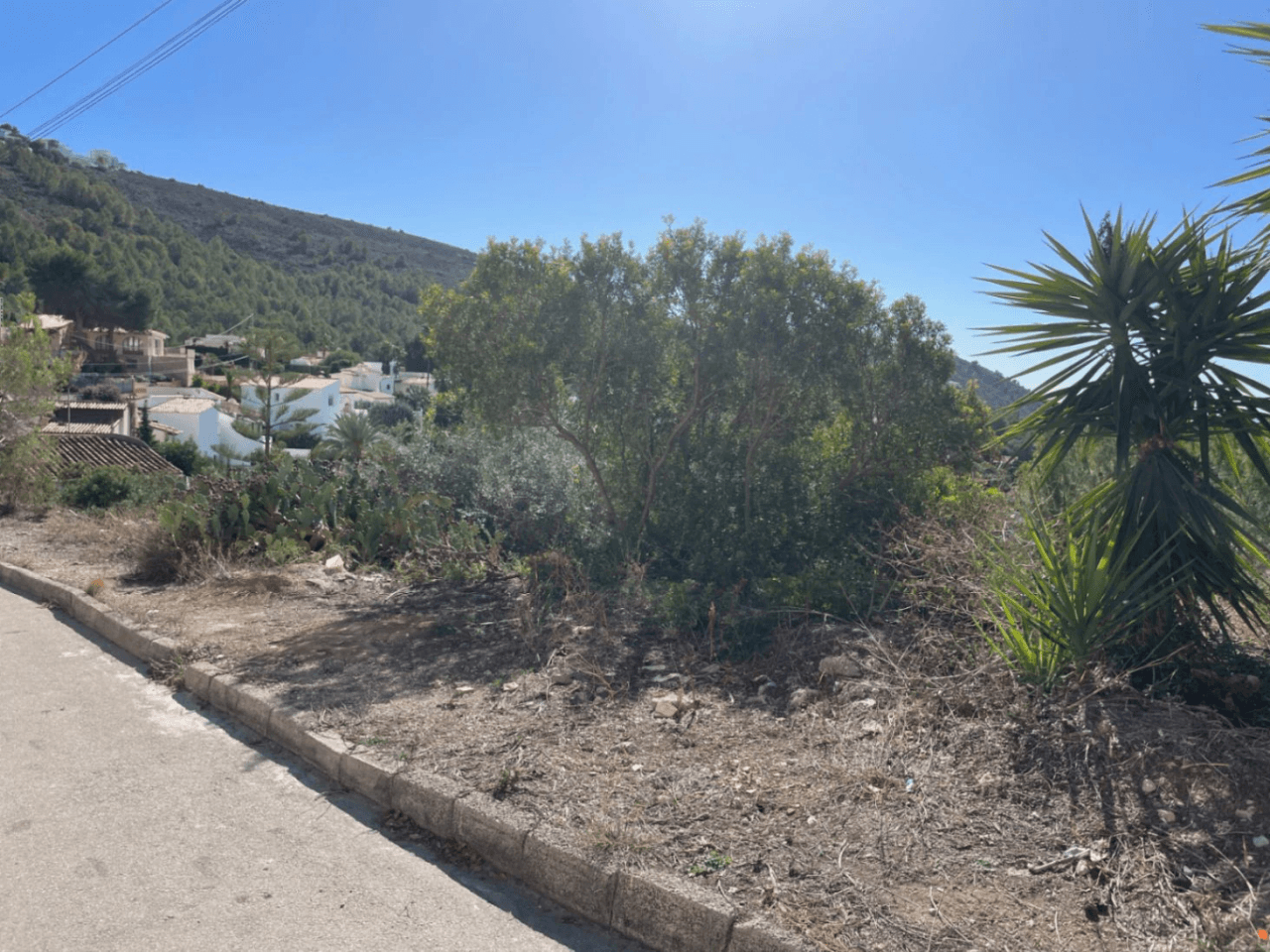 Bouwkavel met uitzicht op zee en bergen in Moraira