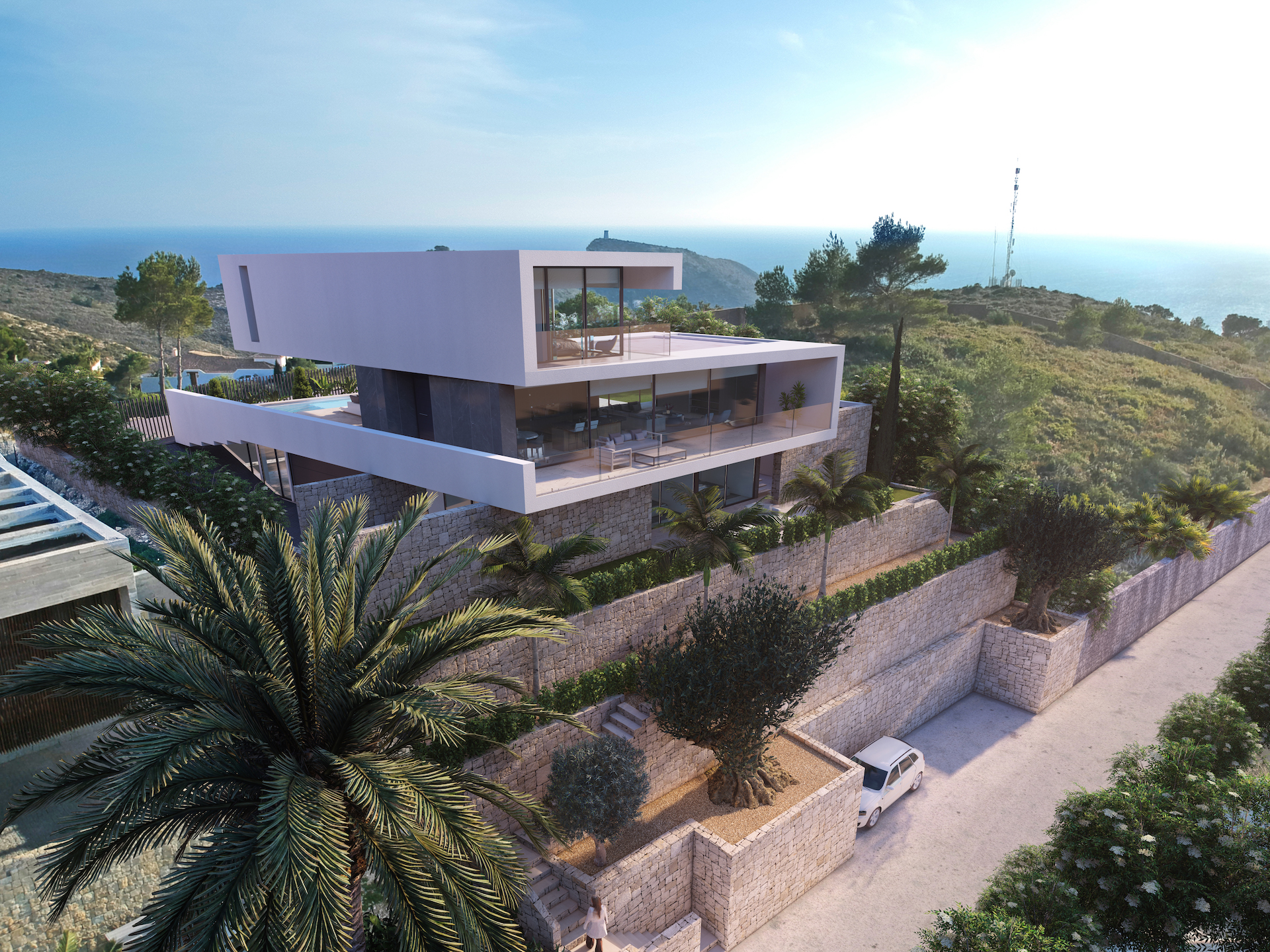 Moderne stijl villa met uitzicht op zee en bouwvergunning in El Portet Moraira